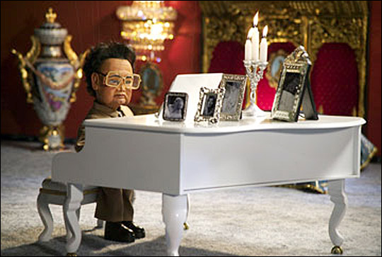 Kim playing piano in Team America