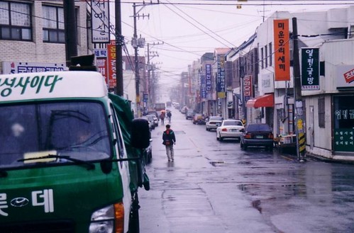A rainy, empty-ish street in University district, during the day. Looks somehow very 1970s to me at this moment. Then again, so did Iksan in some ways. This was three blocks from my place, on a street running perpendicular to the one that skirted the rice field above. unnammed rainy street