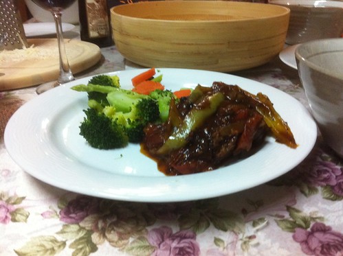 Simmered pork with Gravy and steamed vegetables.