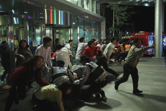The mind-controlled masses, fighting to escape the hospital and go to the river to die. 